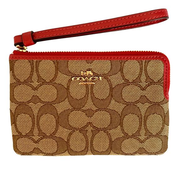 Coach Handbags - Coach Kahki Canvas Monogram with Red Strap Wristlet